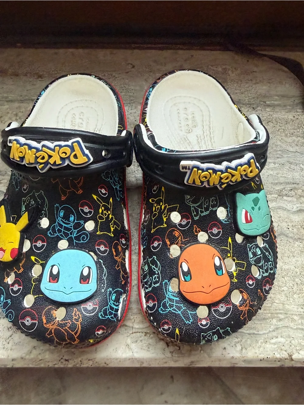 CROCS Black Kids' Pokémon Character Clogs with Yellow Blue Orange Green Accents